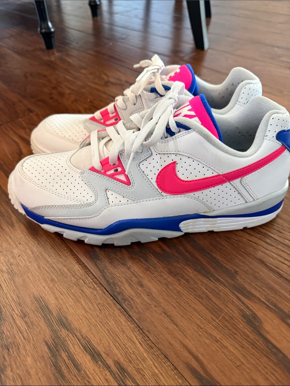 Nike White Men’s Sneakers with Pink Swoosh and Blue Accents